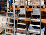 many shelves with boxes and boxes on them in a warehouse