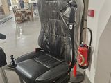 a chair that has been wrapped up in plastic