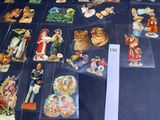 many different types of figurines displayed on the table