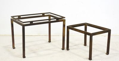 pair of metal and glass side tables in the shape of a coffee table