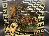 a box with a pokemon figure and a keychain in it
