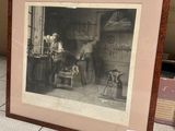 a picture of a man working on a machine in a shop