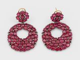 une paire de boucles d'oreilles en rubis et diamants