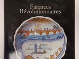 the cover of the book features a picture of a plate with a boat on it
