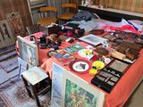 a bed that has a lot of stuff on it