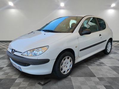 a picture of a white car parked in a garage