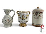 three different types of vases on a white background