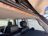 a view of the inside of a car with the back seats folded down