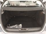the back of a car with the trunk open and the seats down