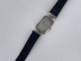 an image of a watch sitting on top of a white table