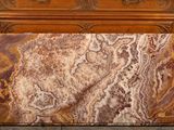 a marble slab sitting on the floor next to a dresser
