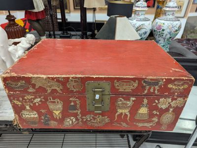 a red box sitting on top of a table