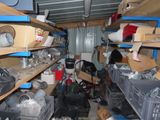 a room filled with lots of boxes and other items