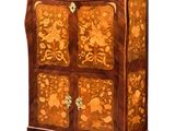 an image of a wooden cabinet with flowers on it