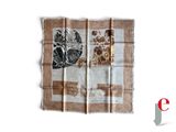 a brown and white scarf with a picture of a giraffe on it