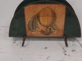 a picture of an old fashioned toaster sitting on a table