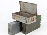 two old suitcases sitting next to each other on a white surface