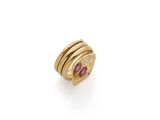 an 18k gold and ruby ring