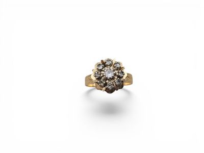 an image of a diamond cluster ring on a white background