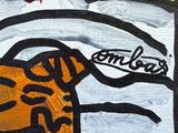 a painting of a tiger on a piece of paper