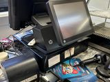an image of a counter with a lot of electronics on it