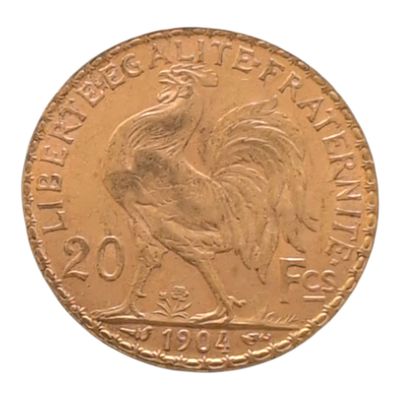 l'image d'une pièce d'or ornée d'un coq