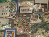 many different types of stamps on the table