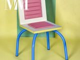 a chair made out of cardboard and a chair made out of cardboard