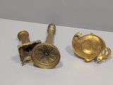 pair of antique brass candlesticks and a brass ashtray