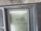 a close up view of a digital clock on a table