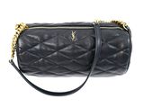 a black quilted bag with a gold chain strap