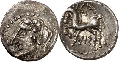 a silver coin with a horse on the front and a horse on the back