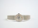 an image of a lady ' s wrist watch with diamonds on it
