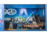 un Playmobil avec un bateau pirate dans la boîte