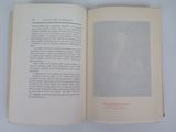 an open book with a picture of a man on it