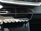 a picture of a car dashboard with a camera mounted on the dash