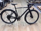 a bike that is sitting on a stand in a store