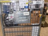 a metal cart with a bunch of boxes in it