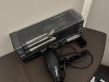 a hair dryer and a hair dryer sitting on a table