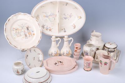 many different types of dishes and cups on the table