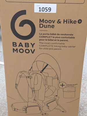 une boîte en carton sur laquelle figure la photo d'un bébé