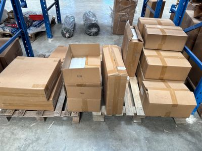 a lot of boxes on a pallet in a warehouse