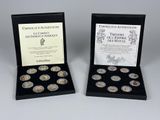 deux pièces d'argent dans un coffret noir sur lequel figure un certificat