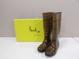 the rain boots are lined up and ready to be worn
