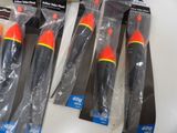 four different types of plastic fishing lures in the package