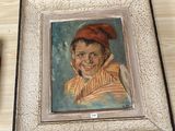 une photo d'un tableau représentant un enfant, dans un cadre