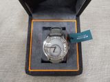 michael korsch watch in a box with a tag on it