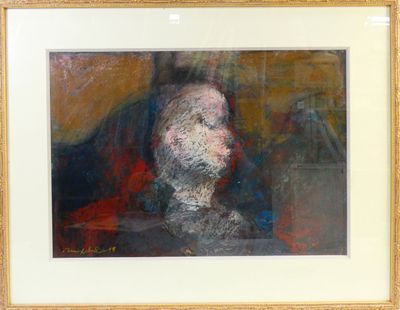 painting of a man with a beard in a gold frame on a wall