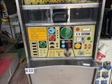 a machine that is sitting on the floor in the room