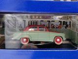 two toy cars that are on display in a box
